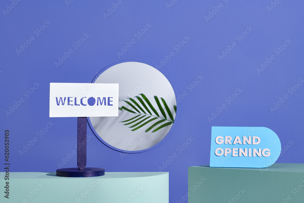A blue sign with the words BRAND OPENING is standing to advertise A blue sign with the words BRAND OPENING is standing to advertise