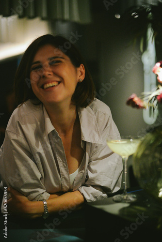 A happy woman in a bar