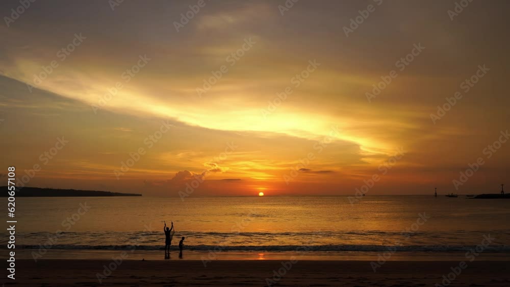 Traditional Authentic life tropical island, fisherman catch fish on background ocean and amazing colorful sunset Traditional Authentic life tropical island, fisherman catch fish on background ocean and amazing colorful sunset