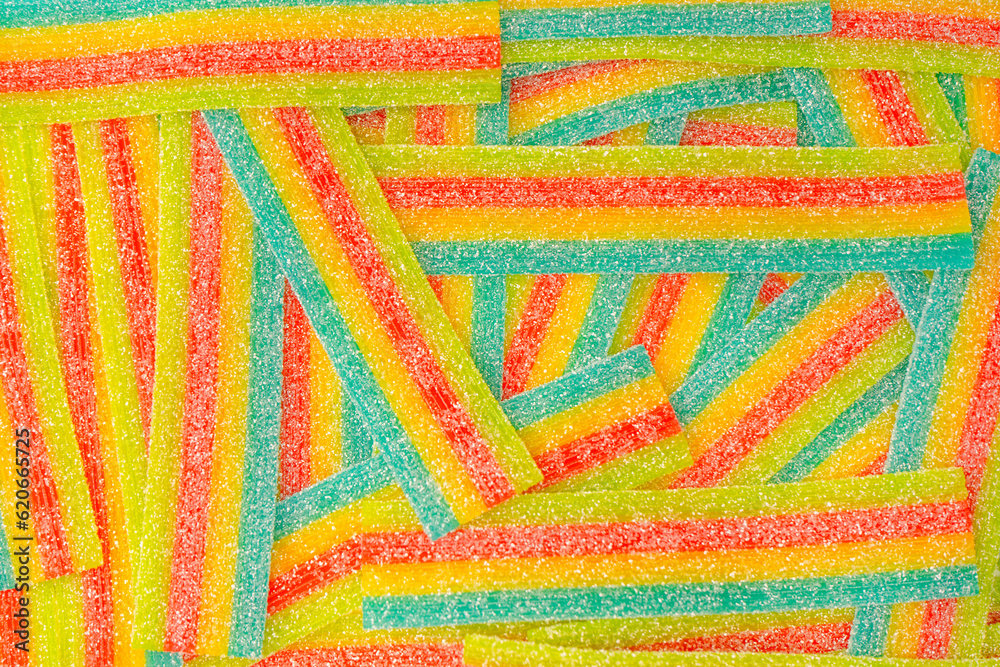 Colorful juicy gummy candies background. Top view. J