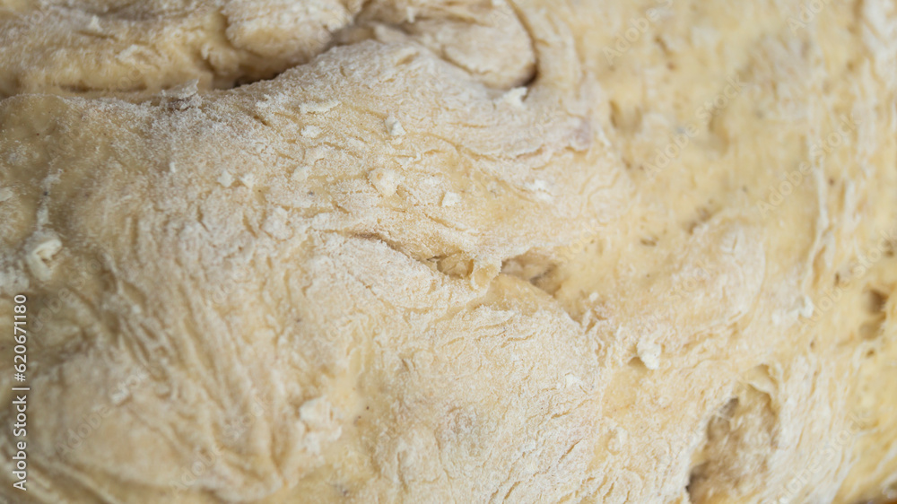 Dough. Dough on a wooden table. A pile of dough Dough. Dough on a wooden table. A pile of dough