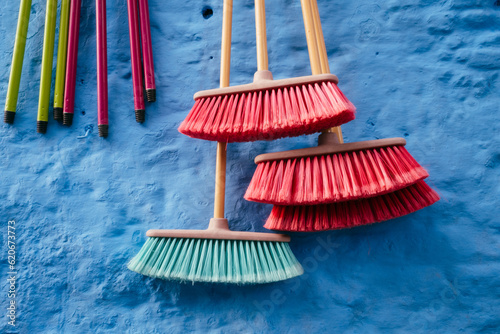 Colored brooms photo