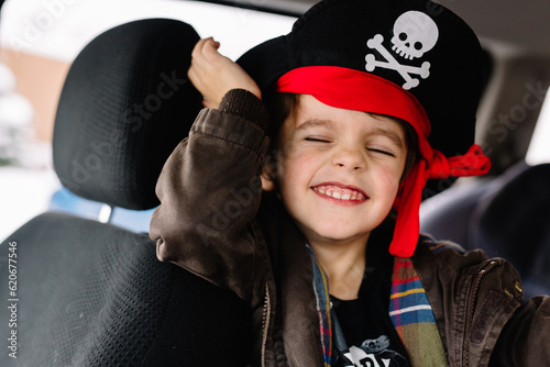 Boy wears pirate hat photo