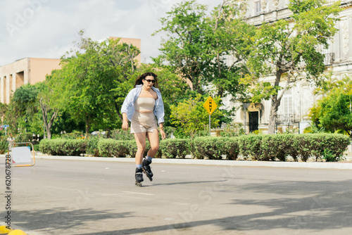 Person skating through the streets of the city. photo