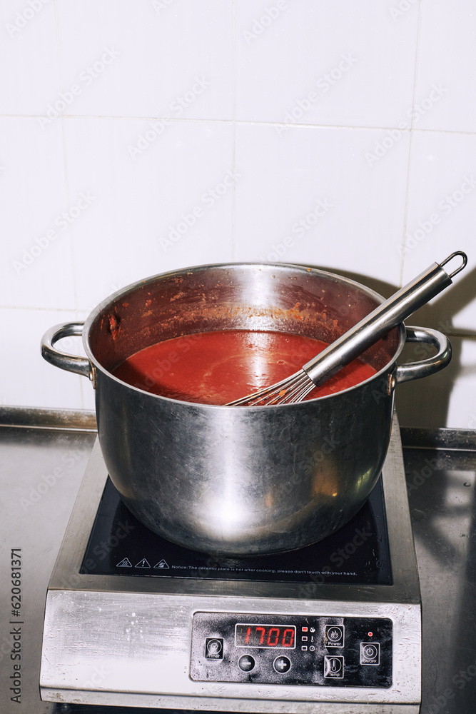 tomato soup is on the stove
tomato soup is on the stove