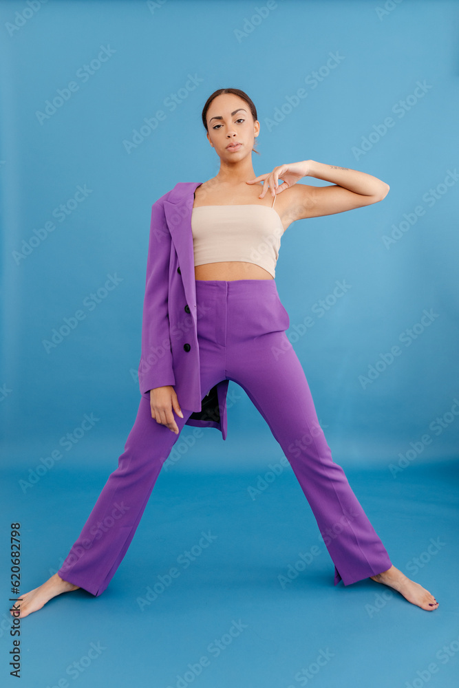Self assured woman in stylish bright suit Self assured woman in stylish bright suit