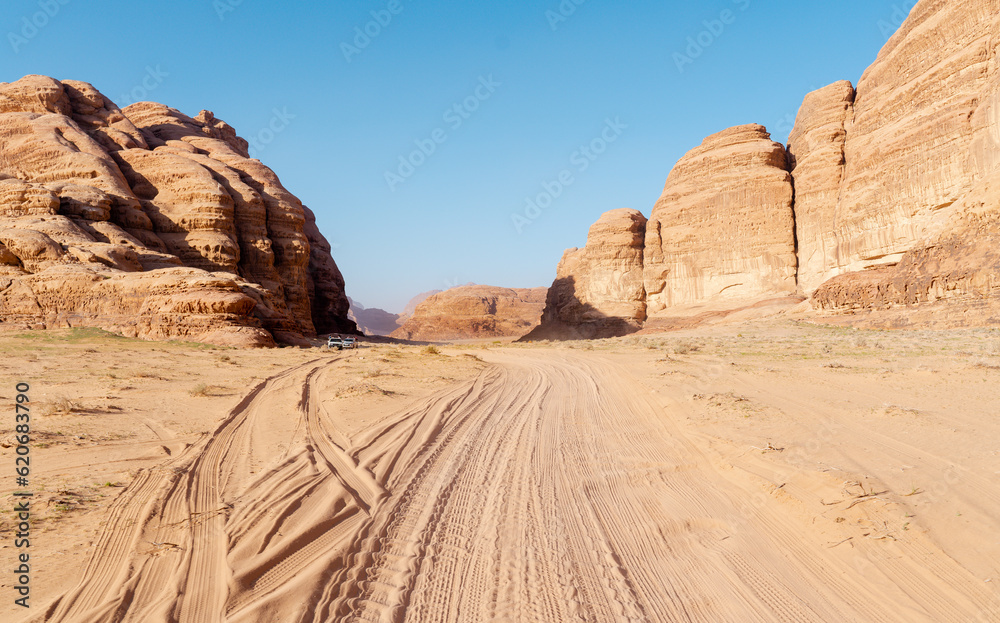 4x4 car in wadi rum desert landscape, Jordan 4x4 car in wadi rum desert landscape, Jordan