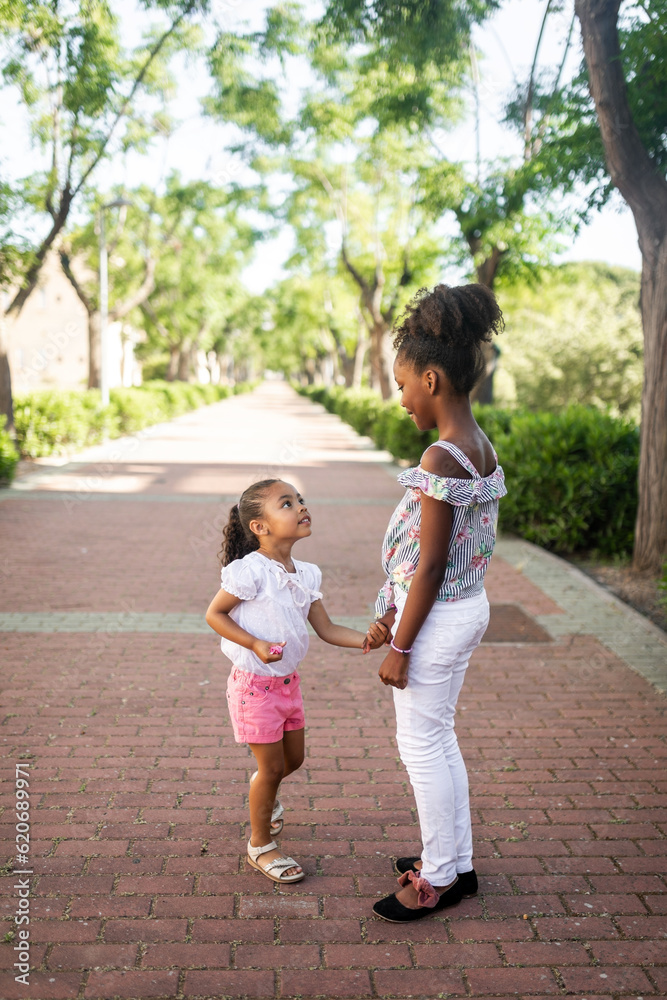 fun and games between black sisters outdoors fun and games between black sisters outdoors