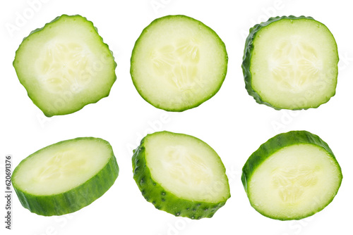 Circles of green cucumbers on a white isolated background. Cucumber slices scatter in different directions. The concept of a delicious addition to a salad.