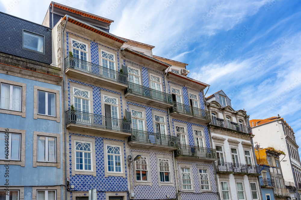 Beautiful colorful building facede in Porto Portugal with azulejo tiles
