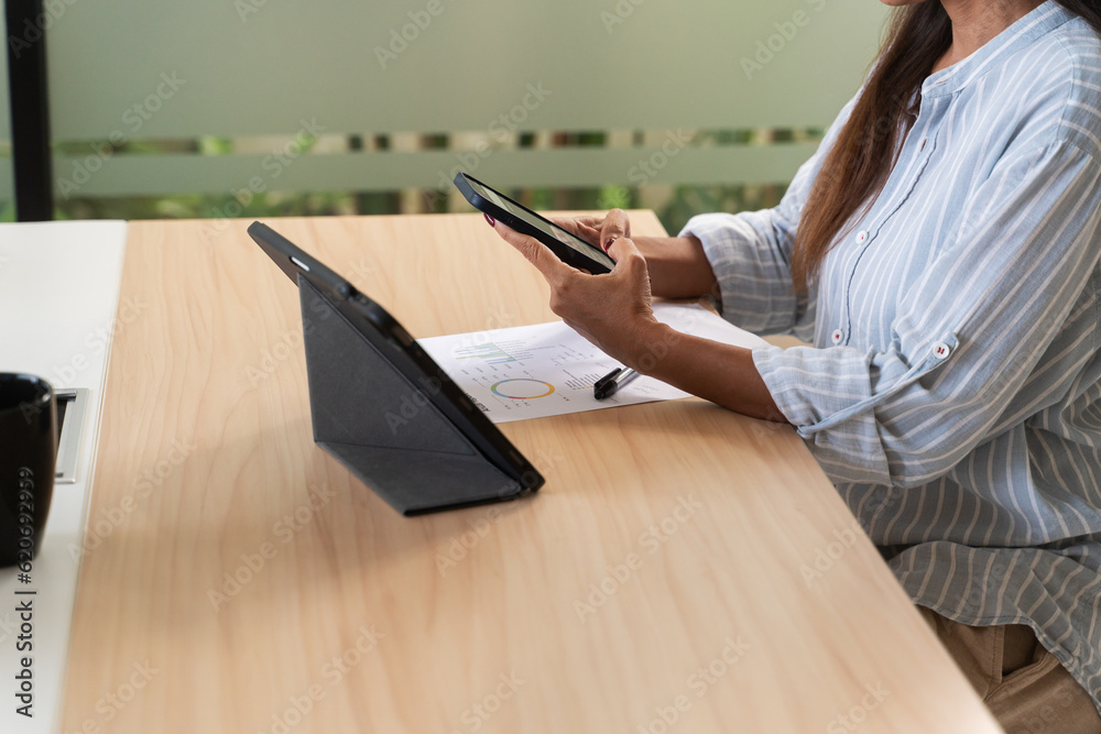 Anonymous Woman Using Phone And Tablet Anonymous Woman Using Phone And Tablet