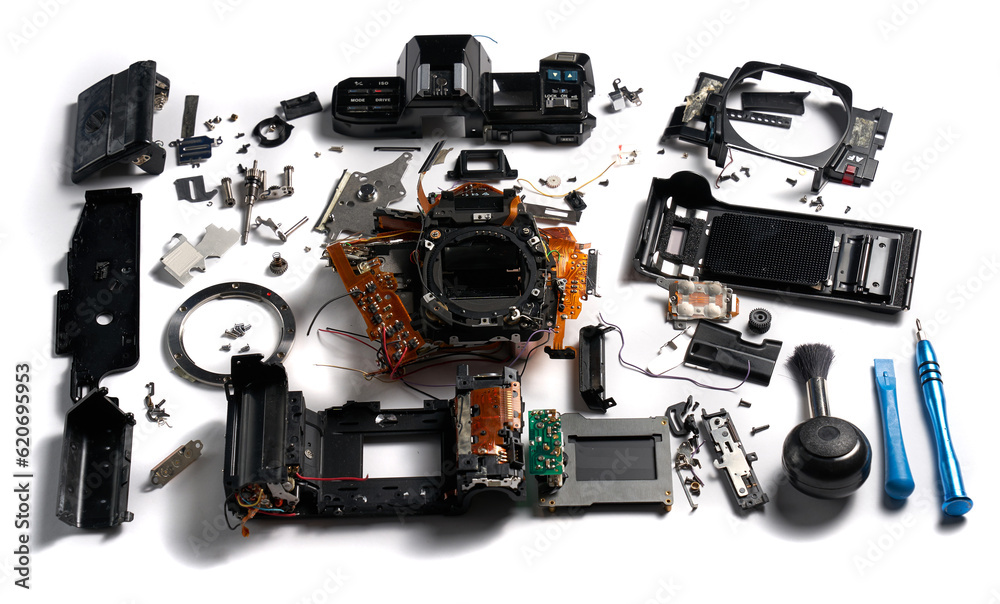 Broken and disassembled DSLR photo camera Broken and disassembled DSLR photo camera