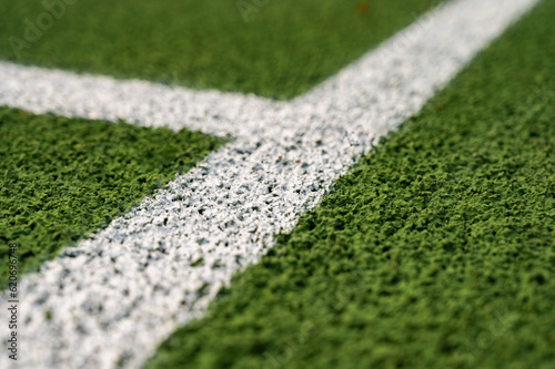 Konstfotografi close-up view of artificial turf, lawn, sports field in a park with artificial g