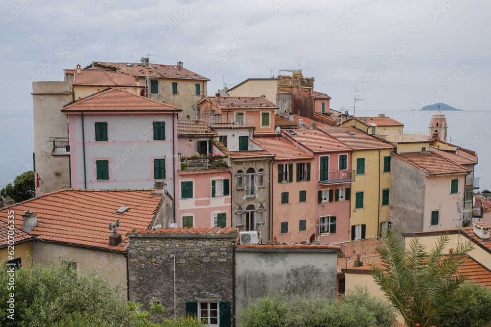 Group of colorful houses with the sea in the background Group of colorful houses with the sea in the background