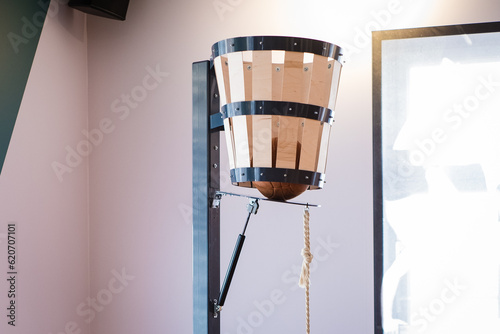 Naismith peach basket. History on basketball. Old wooden basketball basket. James Naismith invented basketball.