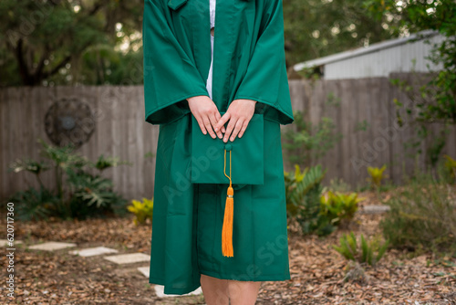 Student holding graduation cap photo