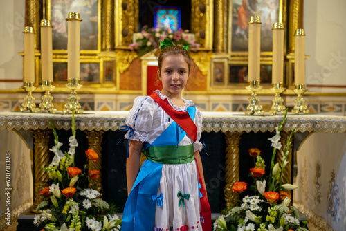 Girl in traditional religious costume