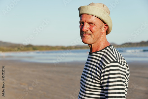 Man having fun at the beach photo