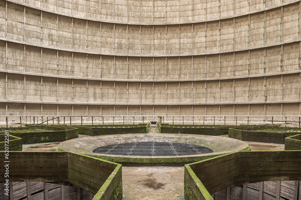 View of the inside of a cooling tower from an abandoned power plant ...