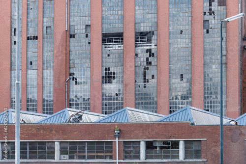 Front view of the Stained glass windows of an abandoned power plant photo