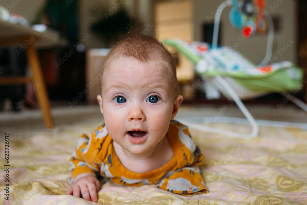 © Amanda Voelker/Stocksy - Tummy Time for baby