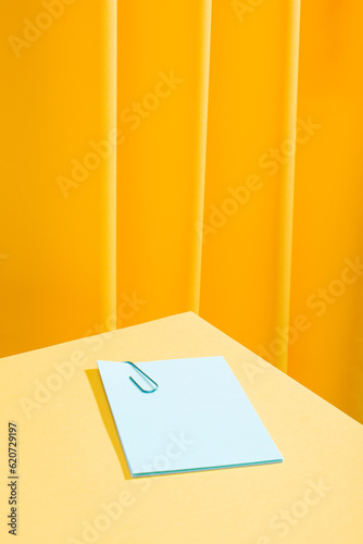 A paper in a yellow table