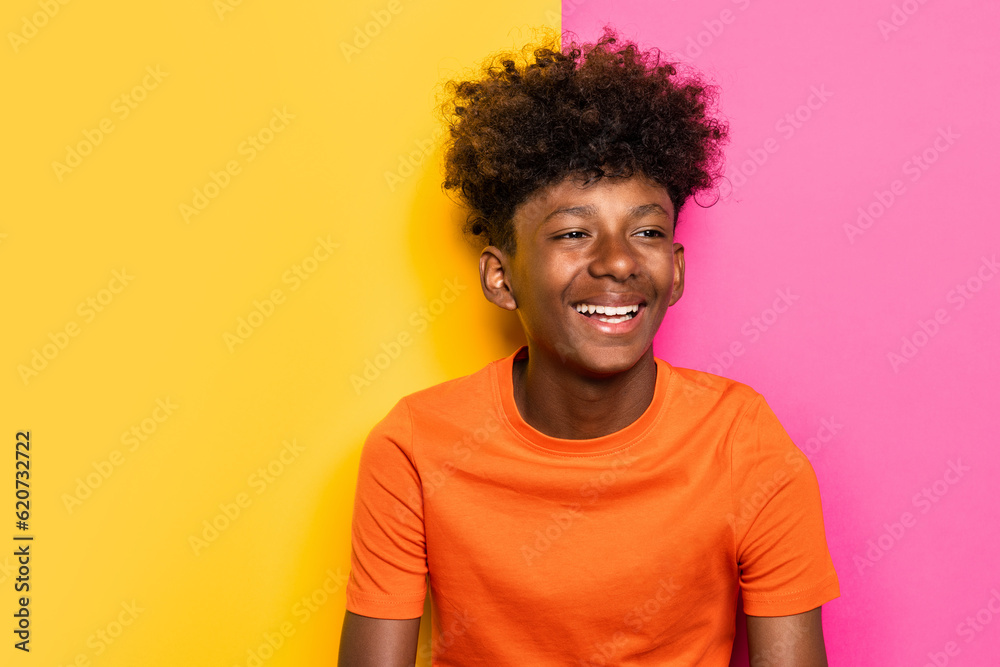 Cheerful black kid with curly hair Cheerful black kid with curly hair