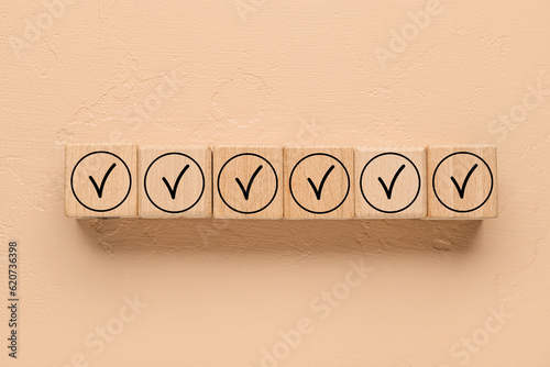 Wooden cubes with check mar...