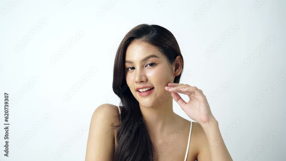 Beautiful Young asian Woman with Clean Fresh Skin on white background, Face care, Facial treatment, Cosmetology, beauty and spa, Asian women portrait Beautiful Young asian Woman with Clean Fresh Skin on white background, Face care, Facial treatment, Cosmetology, beauty and spa, Asian women portrait