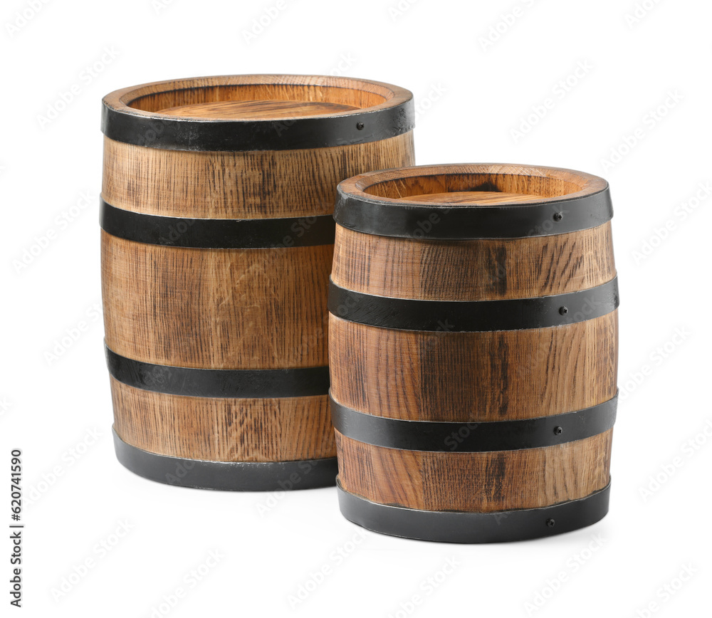 Fototapeta premium Two traditional wooden barrels isolated on white