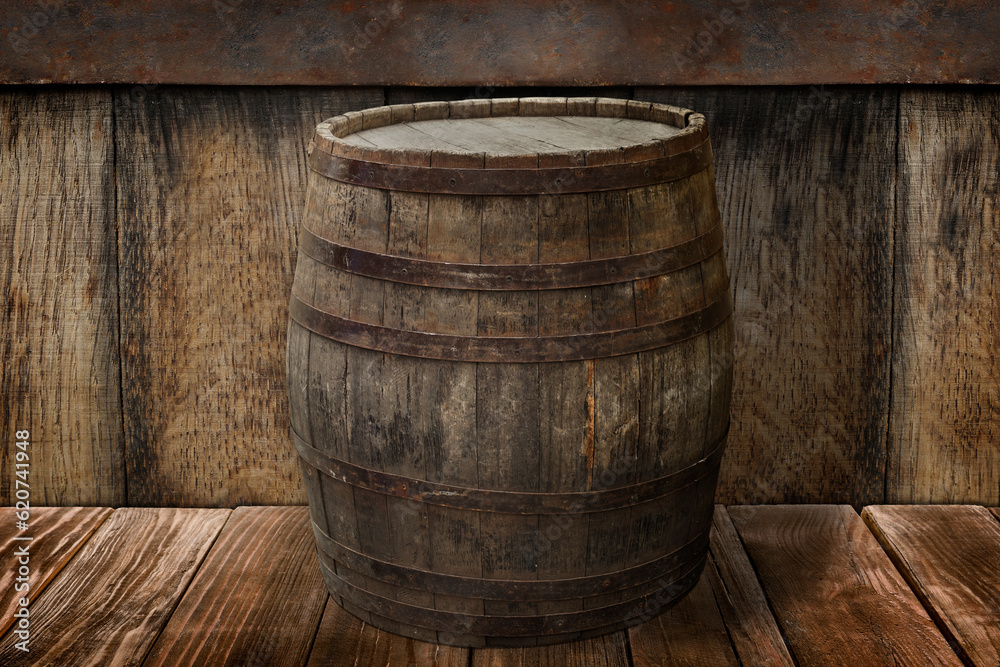 One wooden barrel on brown surface near textured wall