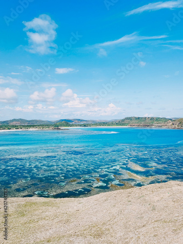Fototapeta Naklejka Na Ścianę i Meble -  Beautiful seascape with sandy beach and azure sea water in Lombok