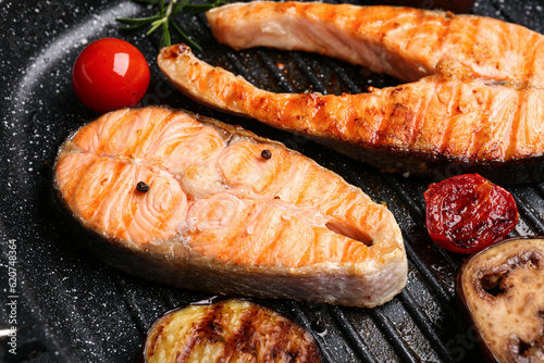 Grilled salmon steaks with ...