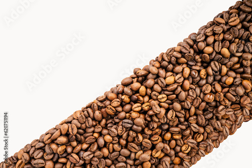 Roasted coffee beans isolated on white background  Roasted coffee beans on white With work path.