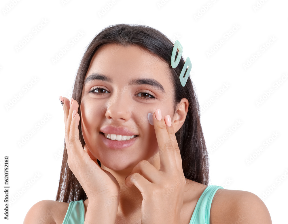 Beautiful young woman applying sunscreen cream on white background, closeup Beautiful young woman applying sunscreen cream on white background, closeup