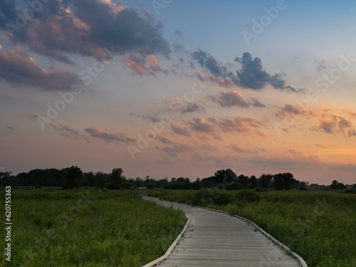 Wetlands Nature Preserve with Colorful Clouds Reflecting Colors of the Sunset