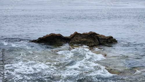 waves breaking on the rocks