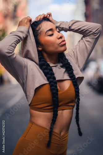 Sporty Woman In Athletic Gear Traveling Around The City