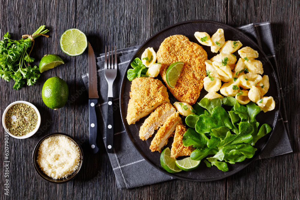 breaded chicken fillet with alfredo pasta shells breaded chicken fillet with alfredo pasta shells