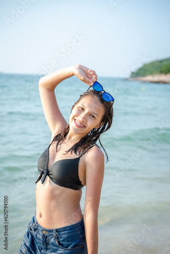 Happy young woman enjoy and fun outdoor activity lifestyle on holiday travel vacation at the sea.