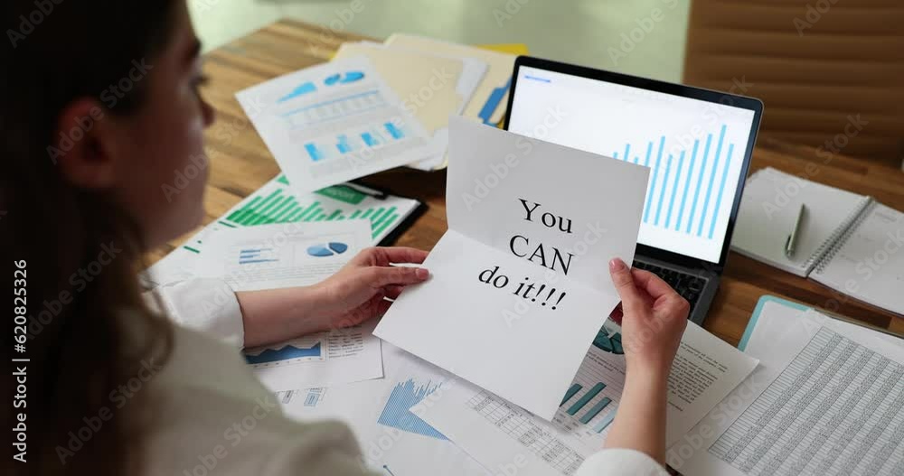Manager reading on sheet you can do it in workplace. Career motivation and successful business goal Manager reading on sheet you can do it in workplace. Career motivation and successful business goal