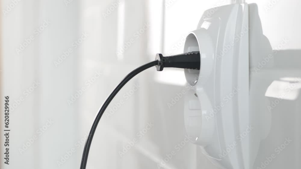 Unplug Electrical Cord in Wall European Socket, Unplugging in Equipment, Electric Power View, Save Cost in Energy Industry Crisis