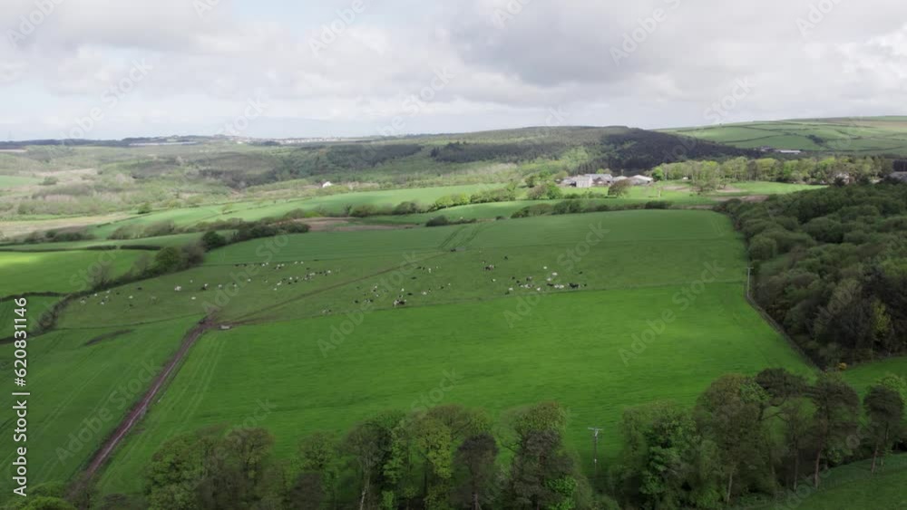 Drone shot of the English countryside. Surrounded by fields and forests. Within the Lake District. Drone shot of the English countryside. Surrounded by fields and forests. Within the Lake District.