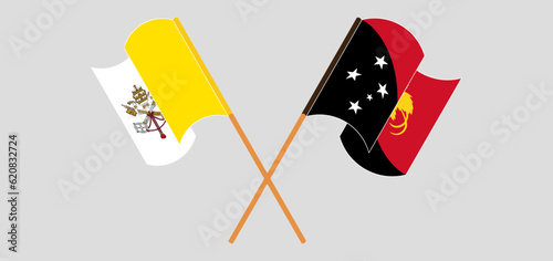 Crossed and waving flags of Vatican and Papua New Guinea