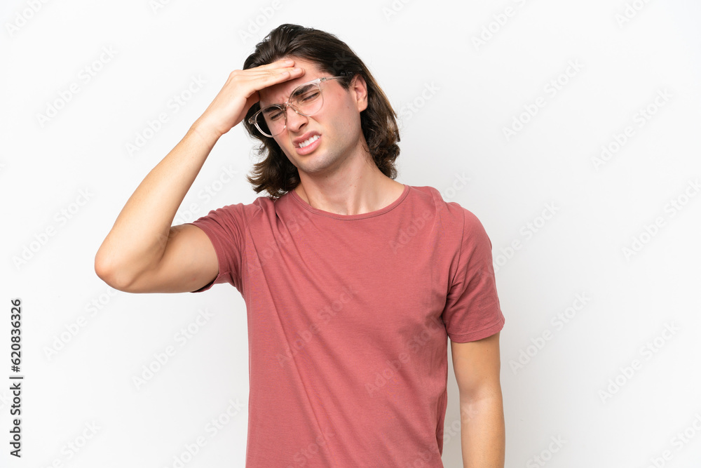 Young handsome man isolated on white background with headache Young handsome man isolated on white background with headache