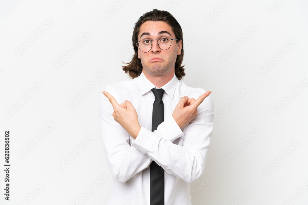 Business handsome man isolated on white background pointing to the laterals having doubts Business handsome man isolated on white background pointing to the laterals having doubts
