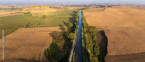 Obraz na płótnie Enchanting Sunrise Over the Scenic Canal de Castilla: An Aerial Perspective w salonie