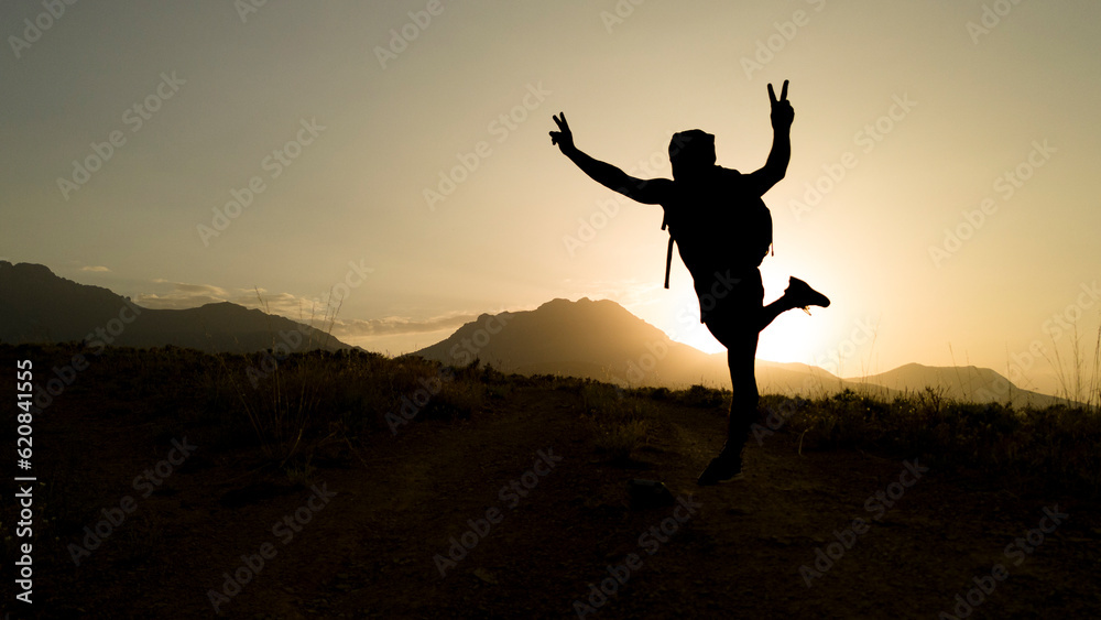 dynamic, enthusiastic and active person making a victory sign dynamic, enthusiastic and active person making a victory sign