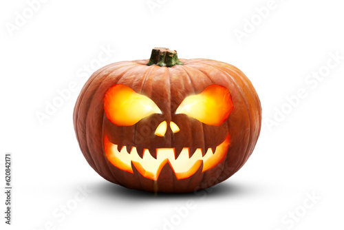 Obraz na płótnie A single lit spooky halloween pumpkins, Jack O Lantern with evil face and eyes isolated against a transparent background. w salonie