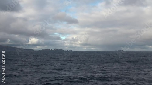 Cruising Cape Horn on Hornos Island, Tierra del Fuego, Chile, South America photo